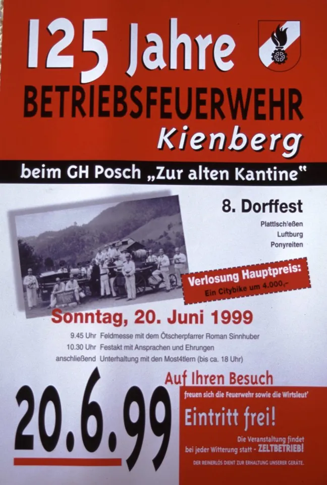 Ein rot-weißes Poster mit schwarzem Text